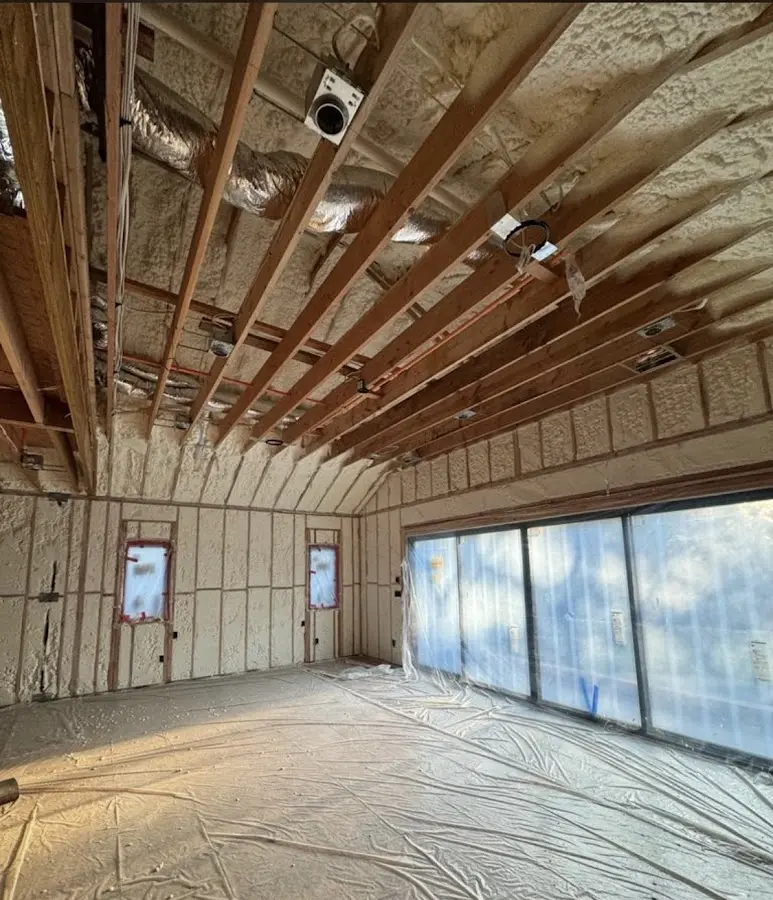 Interior walls and ceiling insulated with spray foam during new construction in Corbin